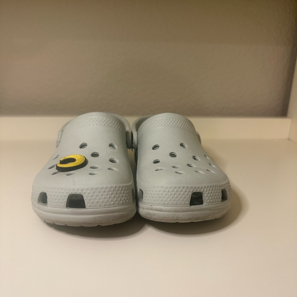 CROCS Kids Light Gray Clogs with Smiley Charm